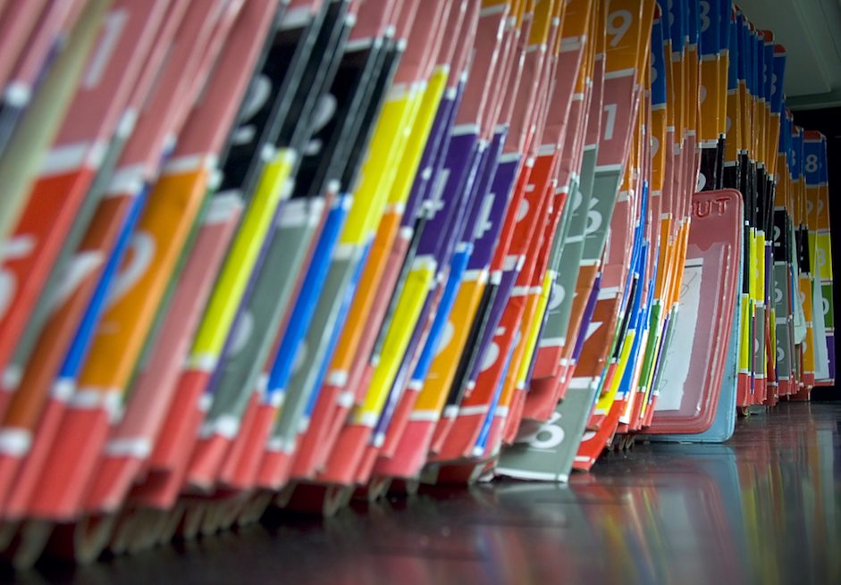Patient files lined up in a row