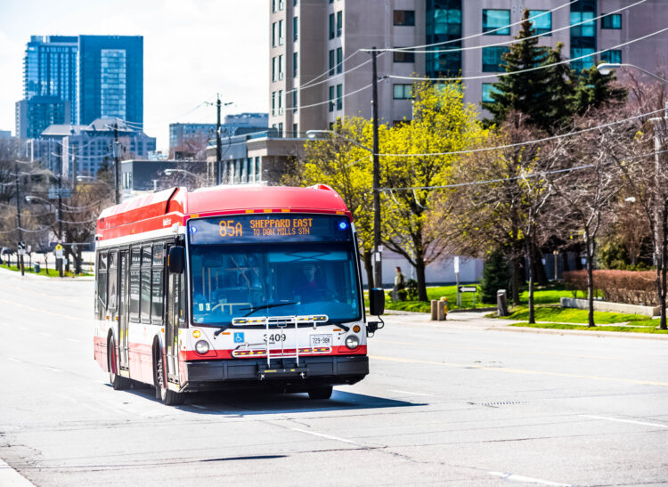 A TTC bus driving during a pandemic with social distancing rules.