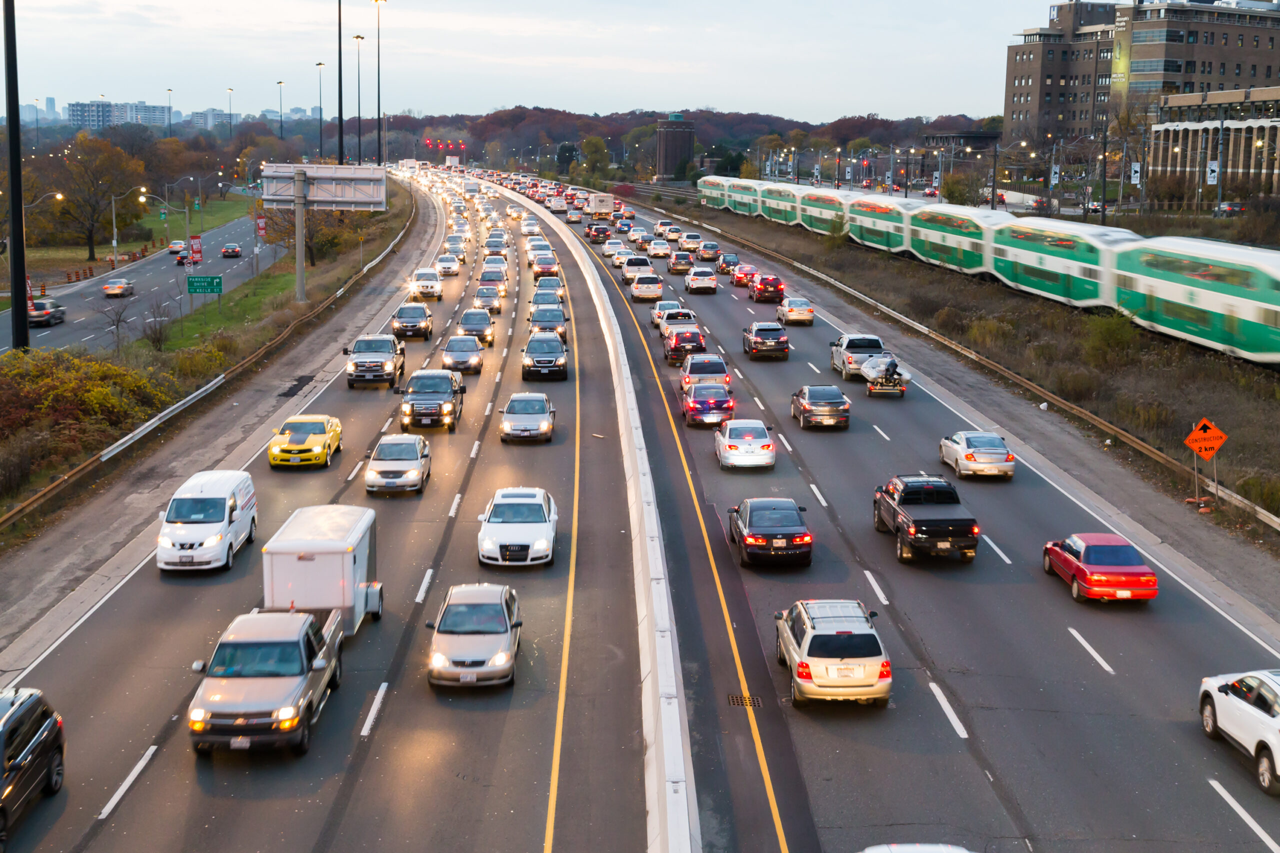 A view of traffic on the Gardiner Express at rush hour. Many vehicles can be seen in the image